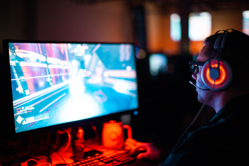 game player on a pc. photo by Sean Do, unsplash licensed
